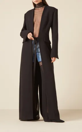 LONG WOOL COAT WITH FASTENINGS