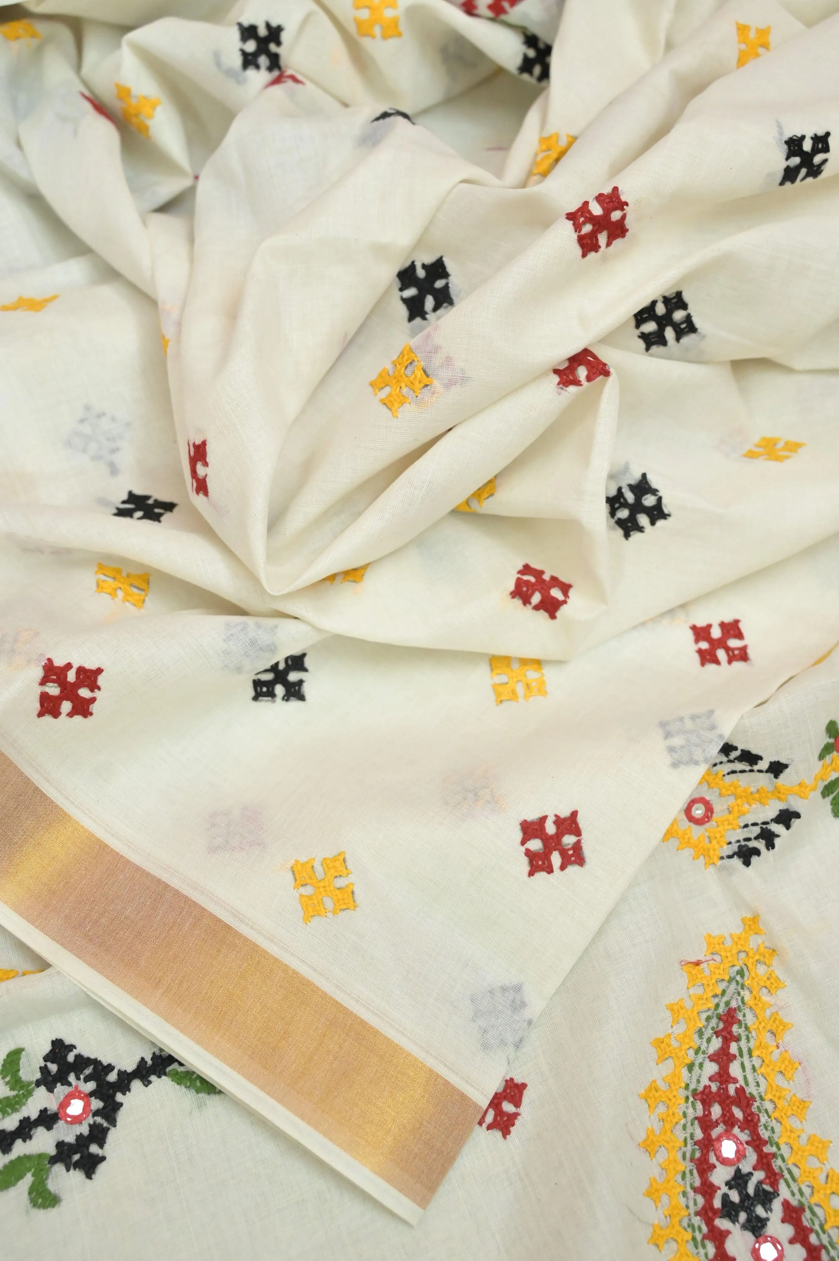 Offwhite Color Kerala Cotton Saree with Zari Border and Gujarati Hand Embroidery